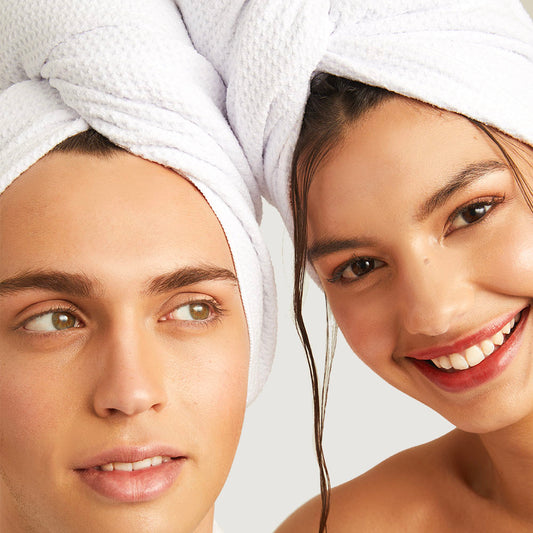 A promotional product bundle for hair and scalp that has a towel and treatment for two 